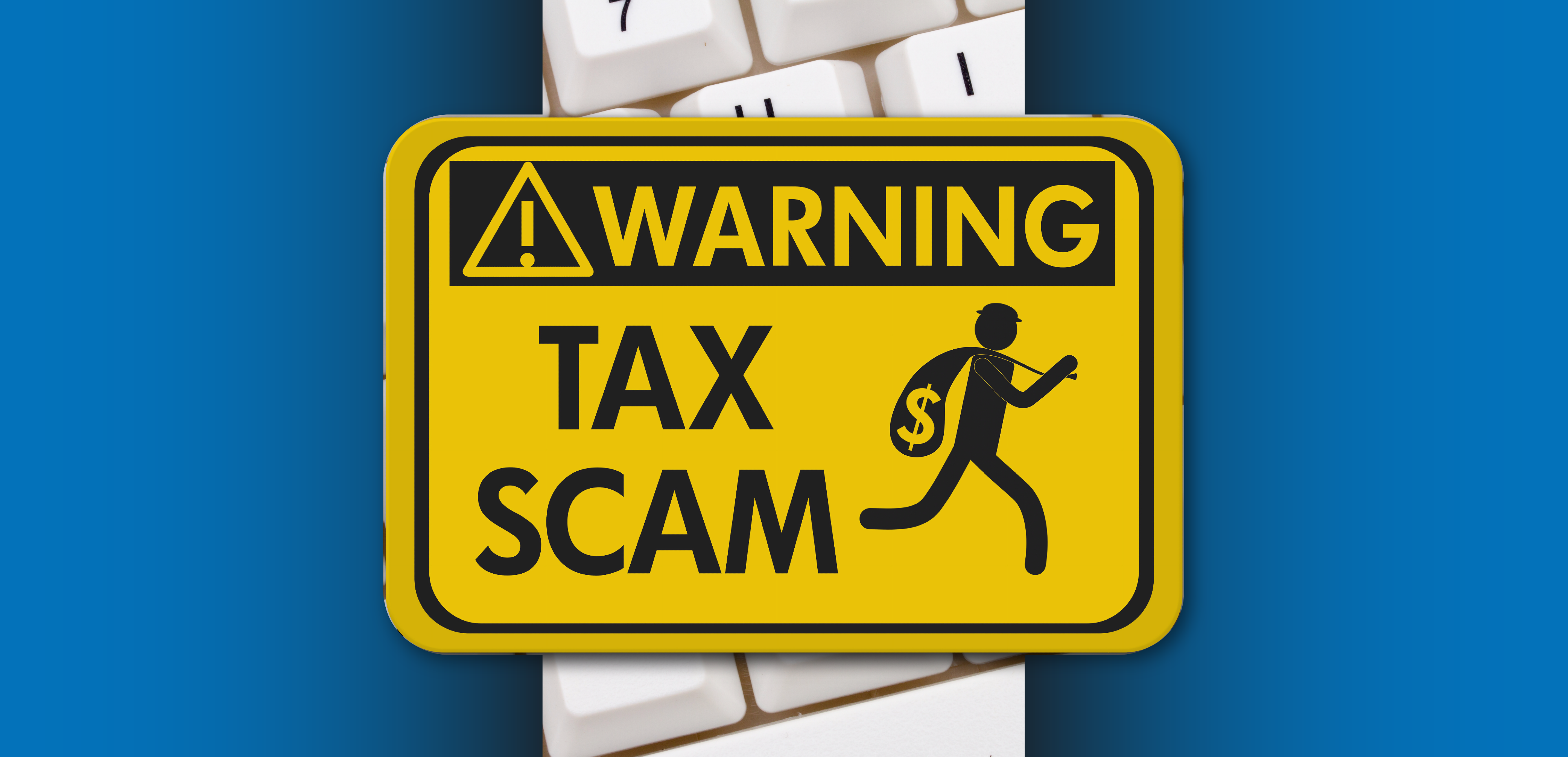 Warning sign with an icon of a person running with a bag of money and the words 'WARNING TAX SCAM' on a yellow background above a keyboard